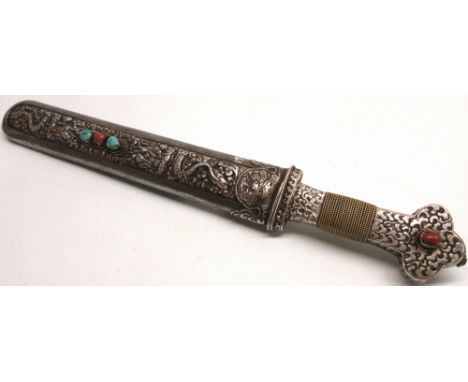 Circa 19th century Tibetan dagger, 10.5" single edged spear point blade, silver (white metal) bound grip with scrollwork engr