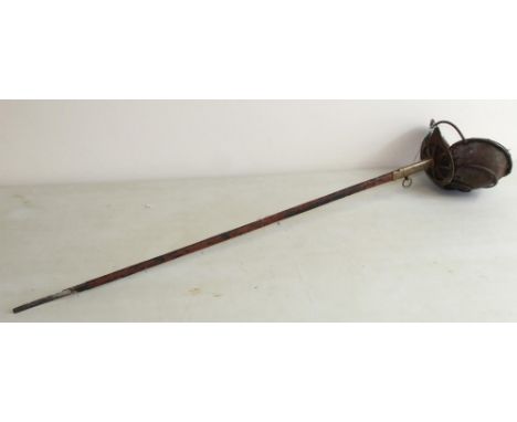 C19th century German basket-hilted Mensurschläger (academic fencing sword) with ray skin hilt, complete with original scabbar