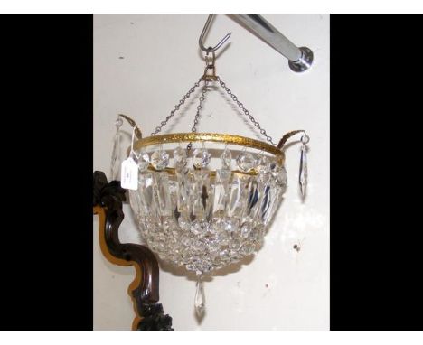 An ornate crystal drop ceiling light