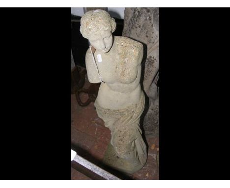 An 87cm high concrete garden female statue 