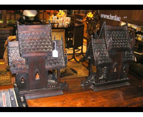 A pair of decorative 50cm high wooden Oriental model houses