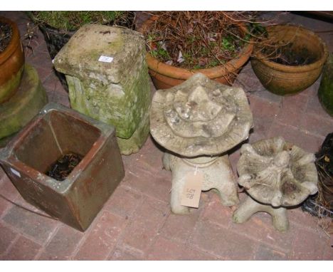 Three garden ornaments, together with a square garden plant pot 