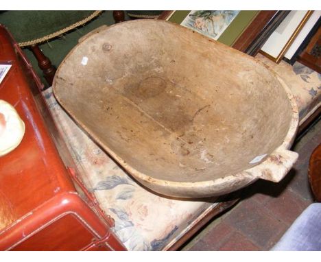 A wooden dough trough