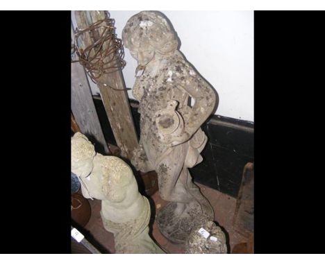 A 110cm high concrete garden statue of female figure holding water vessels 
