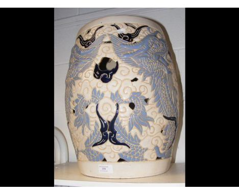 A reproduction Chinese pierced ceramic garden seat 