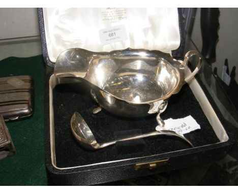 A sauce boat, London hallmark, together with the sauce ladle, maker Viners of Sheffield