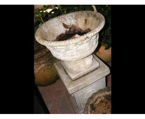 A classical shaped garden plant pot on stand  CONDITION REPORTchip to one corner