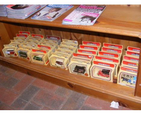 Thirty five boxed die cast model vehicles by Lledo 