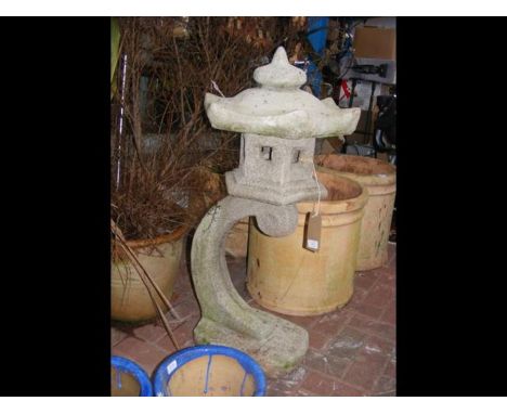 An oriental style concrete garden ornament 