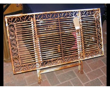 A wrought iron folding garden table CONDITION REPORT90cm length48cm width50cm height