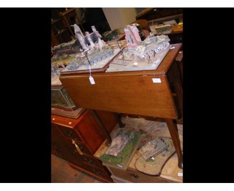 Five World War II scene dioramas and a canon model