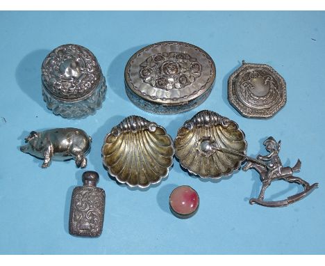 A pair of silver salts in the form of shells and one spoon, Birmingham 1898, a silver topped jar, a small silver scent bottle