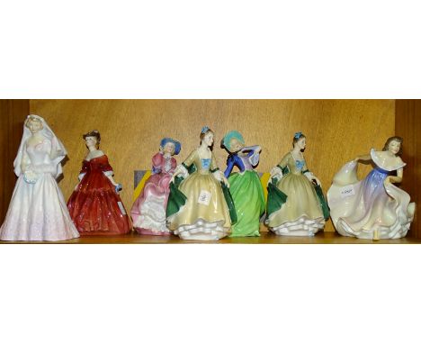 A collection of seven Royal Doulton figurines, 'The Bride' HN2166, 'Elegance' HN2264, (x2), 'Vivienne' HN2073, 'Autumn Breeze