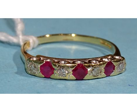 A ruby and diamond ring set four brilliant-cut diamonds and three round-cut rubies, in 18ct gold mount, size T, 2.6g. 