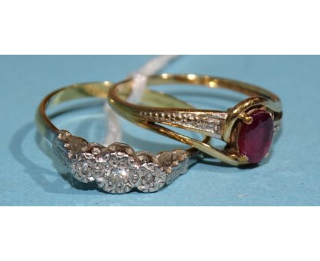 An 18ct gold and platinum ring illusion-set three diamonds, size R, 2.3g and a small ruby and diamond 9ct gold ring, size P, 