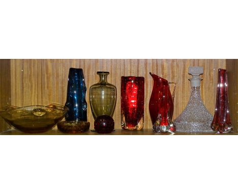 A Whitefriars ruby glass 'bubble' vase, 21.5cm high, a similar paperweight, one other, a blue glass 'knobbly' vase, 25cm high