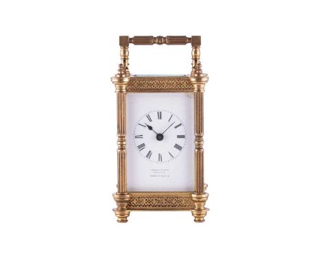Hamilton and Co, of Calcutta a Parisian "Anglaise Riche" jumbo carriage clock, with a simple one-piece white enamel Roman dia