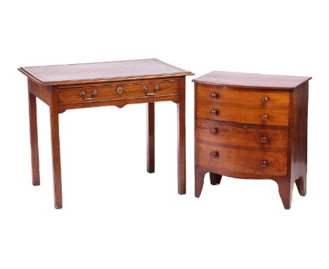 A George III mahogany writing table with cross banded and leather inset top over a single frieze drawer, supported by square 