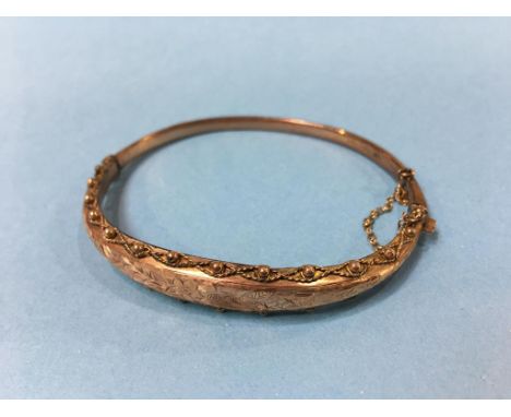 A 9ct gold bangle, 6.7g
