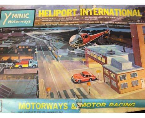 Quantity of assorted vintage toys, including Minic motorways etc.