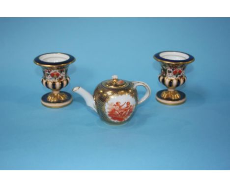 A small Continental miniature teapot, decorated with panels of cherubs, mark in underglaze blue and a pair of Davenport 'Imar