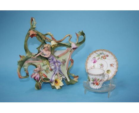 A Continental porcelain centrepiece and three Dresden coffee cans and saucers