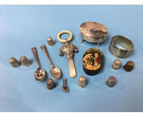 A snuff box, various silver thimbles, teething ring, etc.