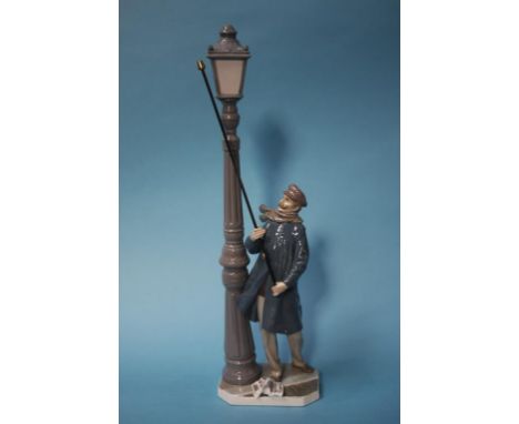 A Lladro Lamplighter figure