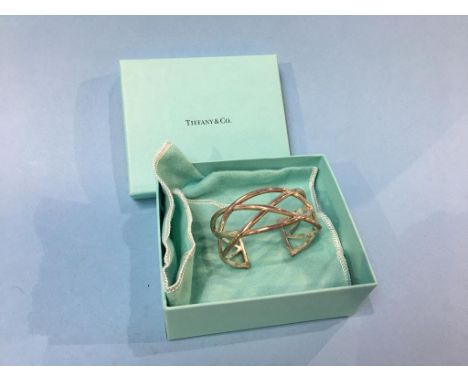 A Tiffany and Co ‘Knots Cuff’ bangle, stamped 925 (boxed)