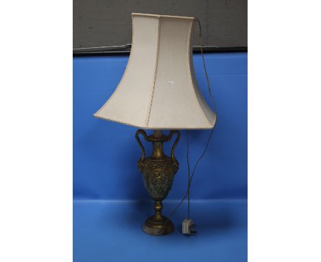 A DECORATIVE GILT LAMP