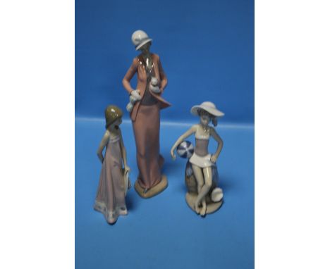 TWO LLADRO FIGURINES AND A NAO FIGURINE (3)Condition Report: The figures have no chips or cracks we can find.  In our opinion