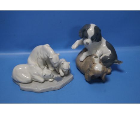 A LLADRO FIGURE GROUP OF POLAR BEARS TOGETHER WITH A NAO FIGURE OF PUPPIES PLAYING