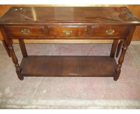 AN OAK HALL SOFA TABLE