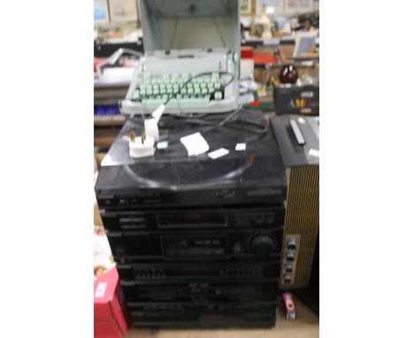 A HERMES 3000 VINTAGE TYPEWRITER TOGETHER WITH A PANASONIC HI FI STACKING SYSTEM