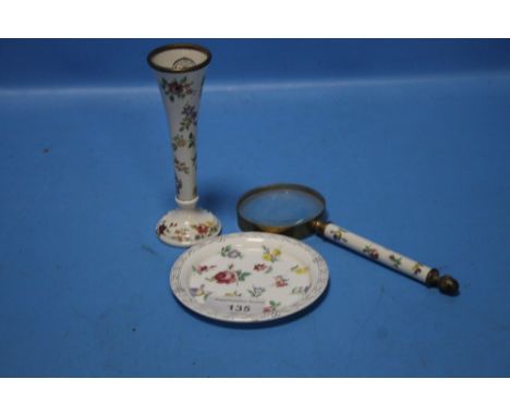 A HALCYON DAYS ENAMEL PLATE, BUD VASE AND MAGNIFYING GLASS (3)