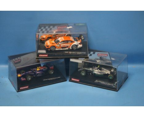 A BOXED CARRERA INFINITI RED BULL RACING RB9 "S. VETTELL, No. 1" AND A BOXED CARRERA AMG MERCEDES C. COUPE DTM "W. WICKENS No