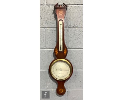 A 19th Century wheel or banjo barometer with thermometer, two inlaid shell paterae and silvered dial, height 95cm, S/D. 