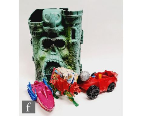 A collection of Mattel Masters of the Universe items, to include Castle Grayskull, Battlecat, Bashasaurus and Land Shark, wit