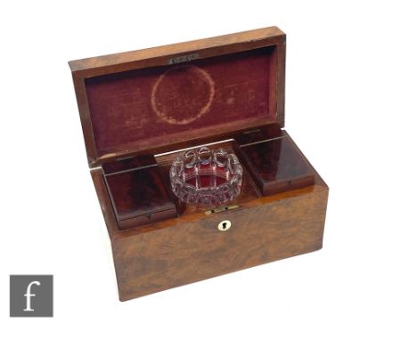 A George III rectangular flame mahogany tea caddy fitted with an associated press moulded glass mixing bowl and two separate 