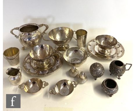 A parcel lot of Colombian silver items to include a sugar basin, two pedestal cups and saucers, three bowls and two further c