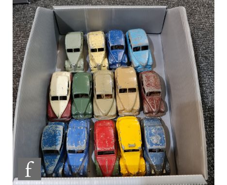 A collection of unboxed and playworn Dinky 40 Series diecast model cars, comprising four 40a/158 Riley Saloon, one in light g