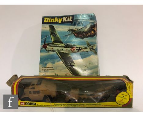 A Corgi 909 Quad Tractor, Ammunition Trailer and Field Gun, with missiles still on sprue, boxed, together with a Dinky Kit 10