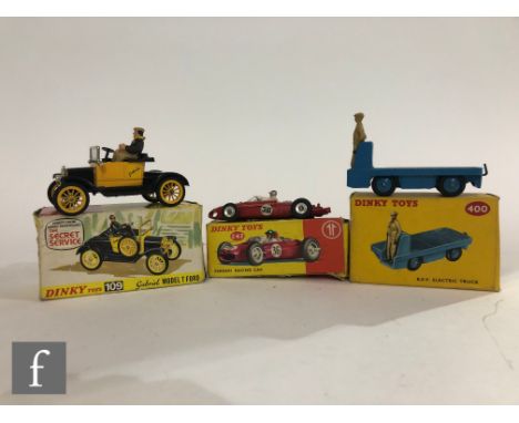 A collection of assorted Dinky diecast models, comprising a 400 BEV Electric Truck in mid blue with tan figure driver, 242 Fe