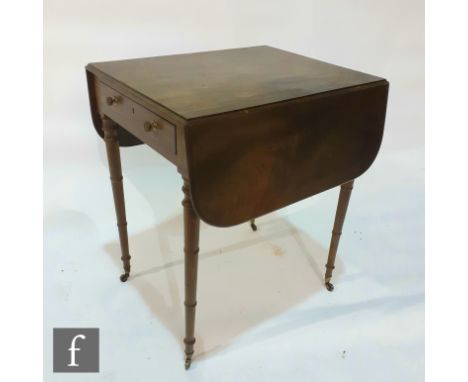 A small George III mahogany drop flap Pembroke table fitted with a single end drawer, brass turned handles on simulated bambo