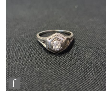 An Art Deco 18ct white gold diamond solitaire ring, old cut claw set stone weight approximately 0.25ct to a hexagonal shaped 