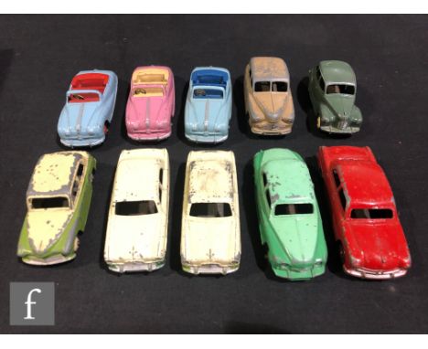 A group of Dinky diecast model cars, comprising 152 Austin Devon in drab green with cream hubs, 162 Ford Zephyr in two tone d