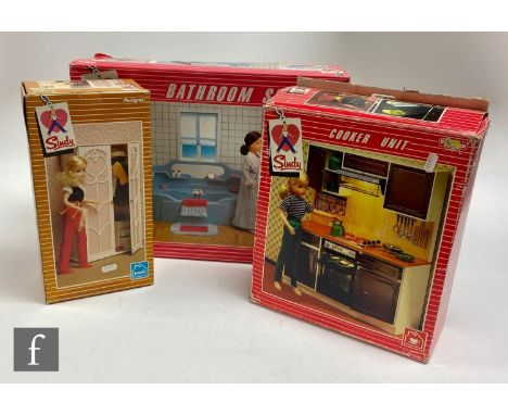 A collection of Pedigree Sindy accessories, to include a 1983 cooker unit with six green accessories, wardrobe, bathroom set 