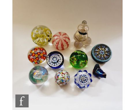 A small assorted collection of paperweights to include Caithness Glass millefiori examples, Perthshire Cartwheel, a Murano La