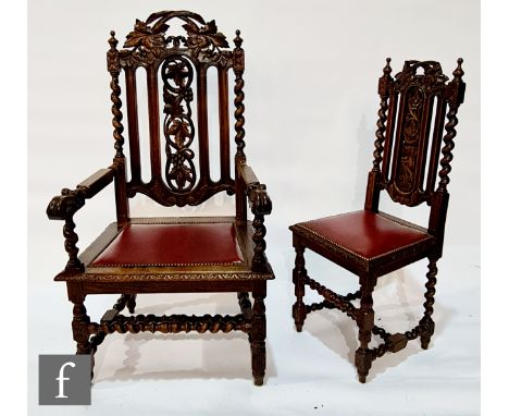 A set of six Victorian carved oak dining chairs comprising two elbow and four standard chairs, the leaf and grape panel backs