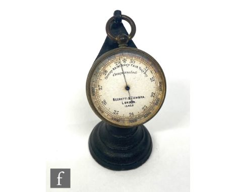 A Negretti &amp; Zambra compensated pocket barometer No 13450 with associated stand. 